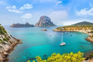 Es Vedra island at sunset with dramatic sky showing mystical and mysterious atmosphere in Ibiza